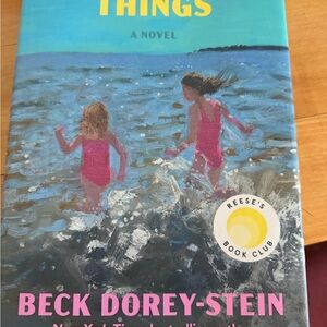 Paperback Book with Teal Blue Cover and Yellow Text